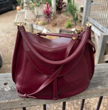 JUNO - A Spacier Judy Handbag with a new smart handle making the bag less rigid like standing Gard… and classier by articulating the handle with two knees that allow the handle to swivell! or Cross Body bag with a detachable and adjustable shoulder strap.