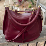 JUNO - A Spacier Judy Handbag with a new smart handle making the bag less rigid like standing Gard… and classier by articulating the handle with two knees that allow the handle to swivell! or Cross Body bag with a detachable and adjustable shoulder strap.