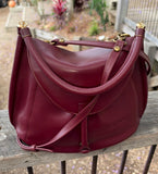 JUNO - A Spacier Judy Handbag with a new smart handle making the bag less rigid like standing Gard… and classier by articulating the handle with two knees that allow the handle to swivell! or Cross Body bag with a detachable and adjustable shoulder strap.