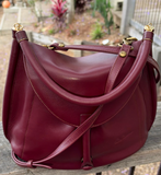 JUNO - A Spacier Judy Handbag with a new smart handle making the bag less rigid like standing Gard… and classier by articulating the handle with two knees that allow the handle to swivell! or Cross Body bag with a detachable and adjustable shoulder strap.