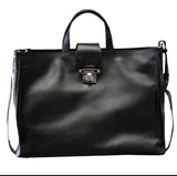 Loretta H - New! Handles and detachable and removable shoulder strap. Front strap over with turn lock.