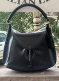 JUNO - A Spacier Judy Handbag with a new smart handle making the bag less rigid like standing Gard… and classier by articulating the handle with two knees that allow the handle to swivell! or Cross Body bag with a detachable and adjustable shoulder strap.