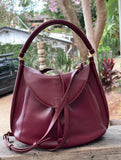 JUNO - A Spacier Judy Handbag with a new smart handle making the bag less rigid like standing Gard… and classier by articulating the handle with two knees that allow the handle to swivell! or Cross Body bag with a detachable and adjustable shoulder strap.