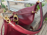 JUNO - A Spacier Judy Handbag with a new smart handle making the bag less rigid like standing Gard… and classier by articulating the handle with two knees that allow the handle to swivell! or Cross Body bag with a detachable and adjustable shoulder strap.