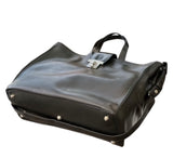 Loretta H - New! Handles and detachable and removable shoulder strap. Front strap over with turn lock.